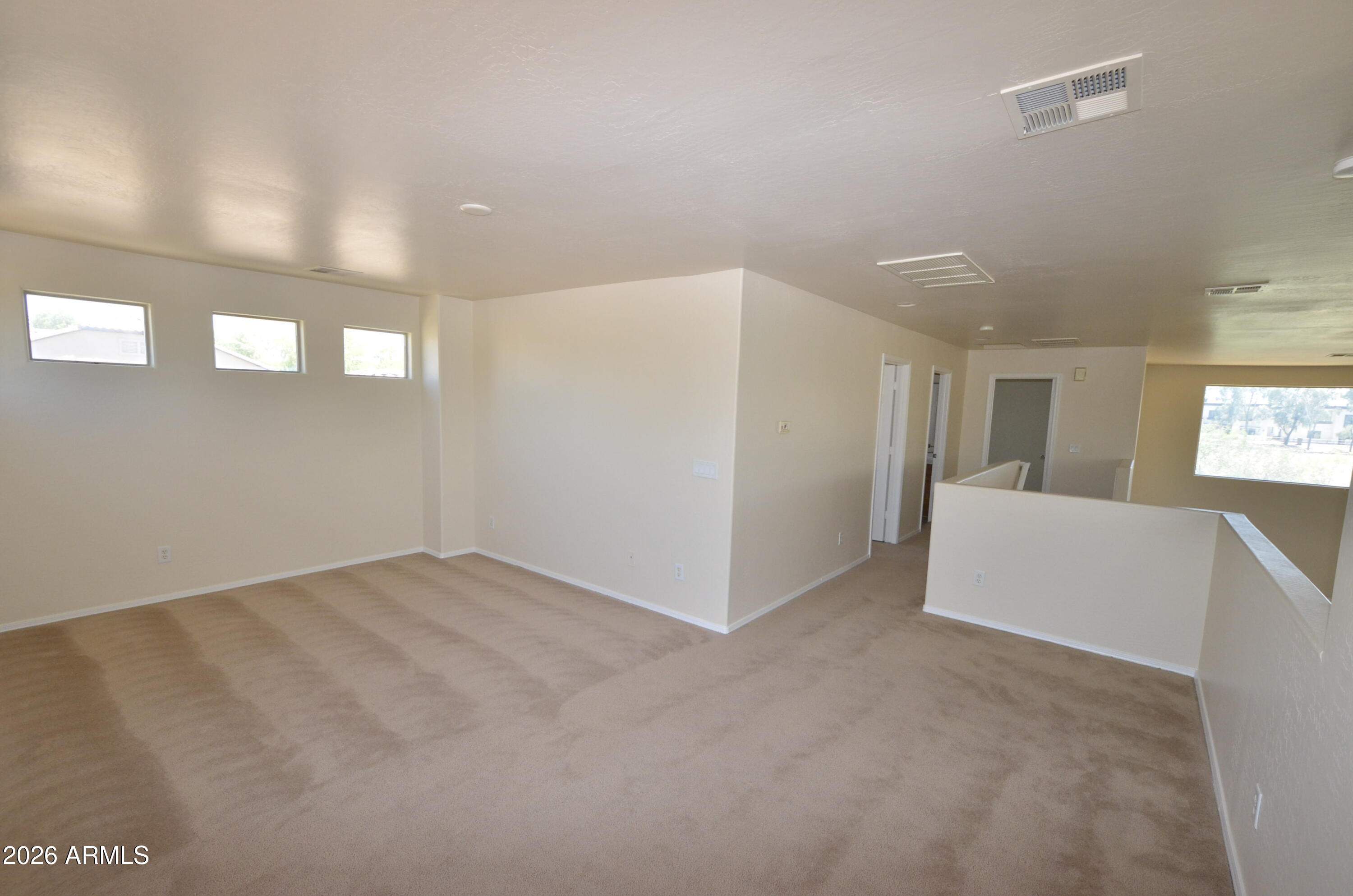3995 East Trigger Way Gilbert, AZ 85297 - Photo 15 of 23 a view of an empty room with a window