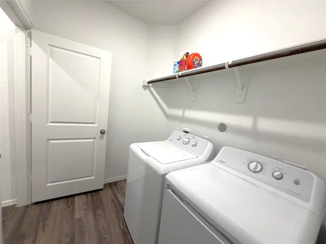 a utility room with dryer and washer