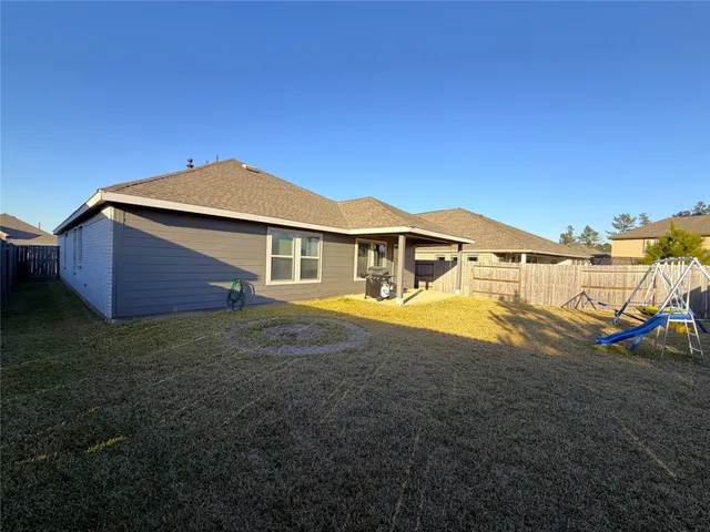 a house view with a garden space