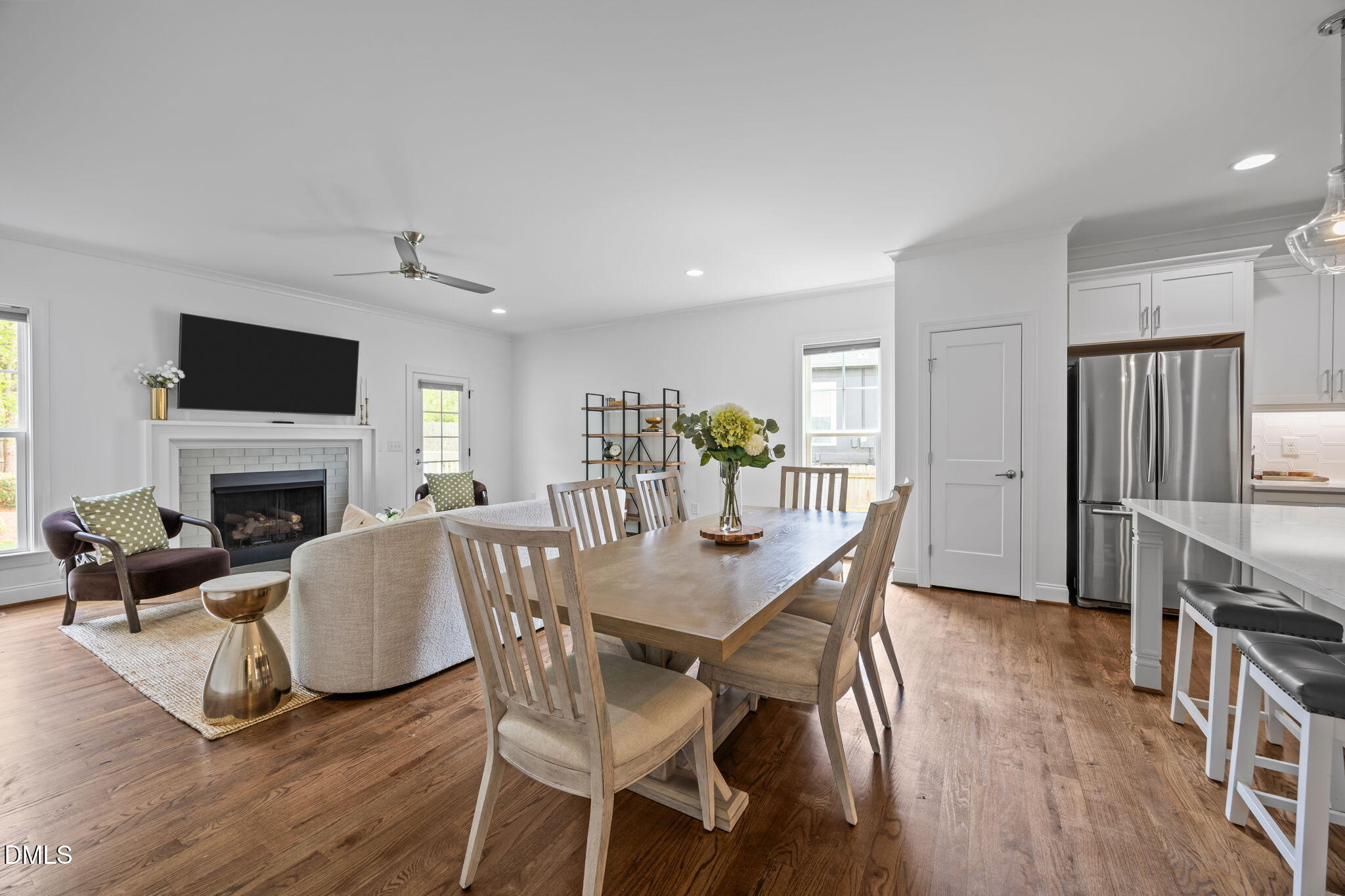 804 Hartford Road Raleigh, NC 27610 - Photo 6 of 26 a view of a dining room with furniture window and wooden floor