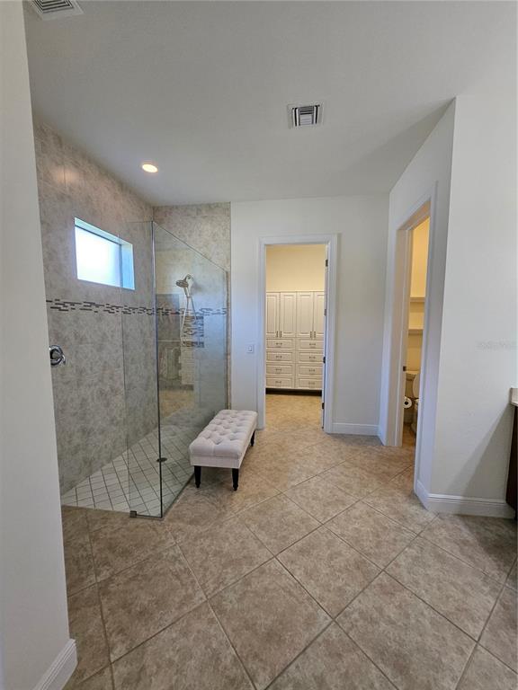 1283 Manado Drive Naples, FL 34113 - Photo 30 of 48 a view of an empty room and bathroom