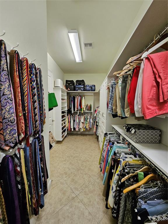 1283 Manado Drive Naples, FL 34113 - Photo 32 of 48 a view of a room with gym equipment