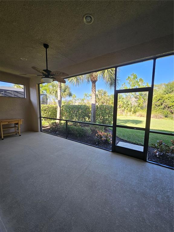 1283 Manado Drive Naples, FL 34113 - Photo 34 of 48 a view of room with furniture and windows