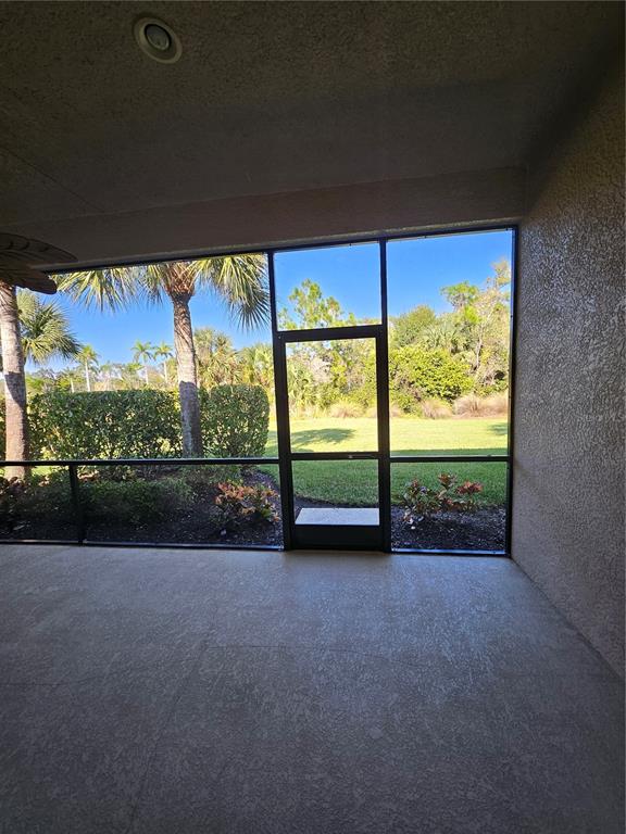 1283 Manado Drive Naples, FL 34113 - Photo 35 of 48 a view of a porch with furniture and garden