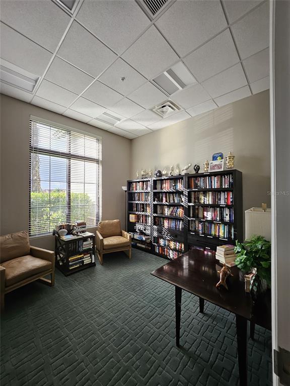 1283 Manado Drive Naples, FL 34113 - Photo 46 of 48 a livingroom with furniture and a large window