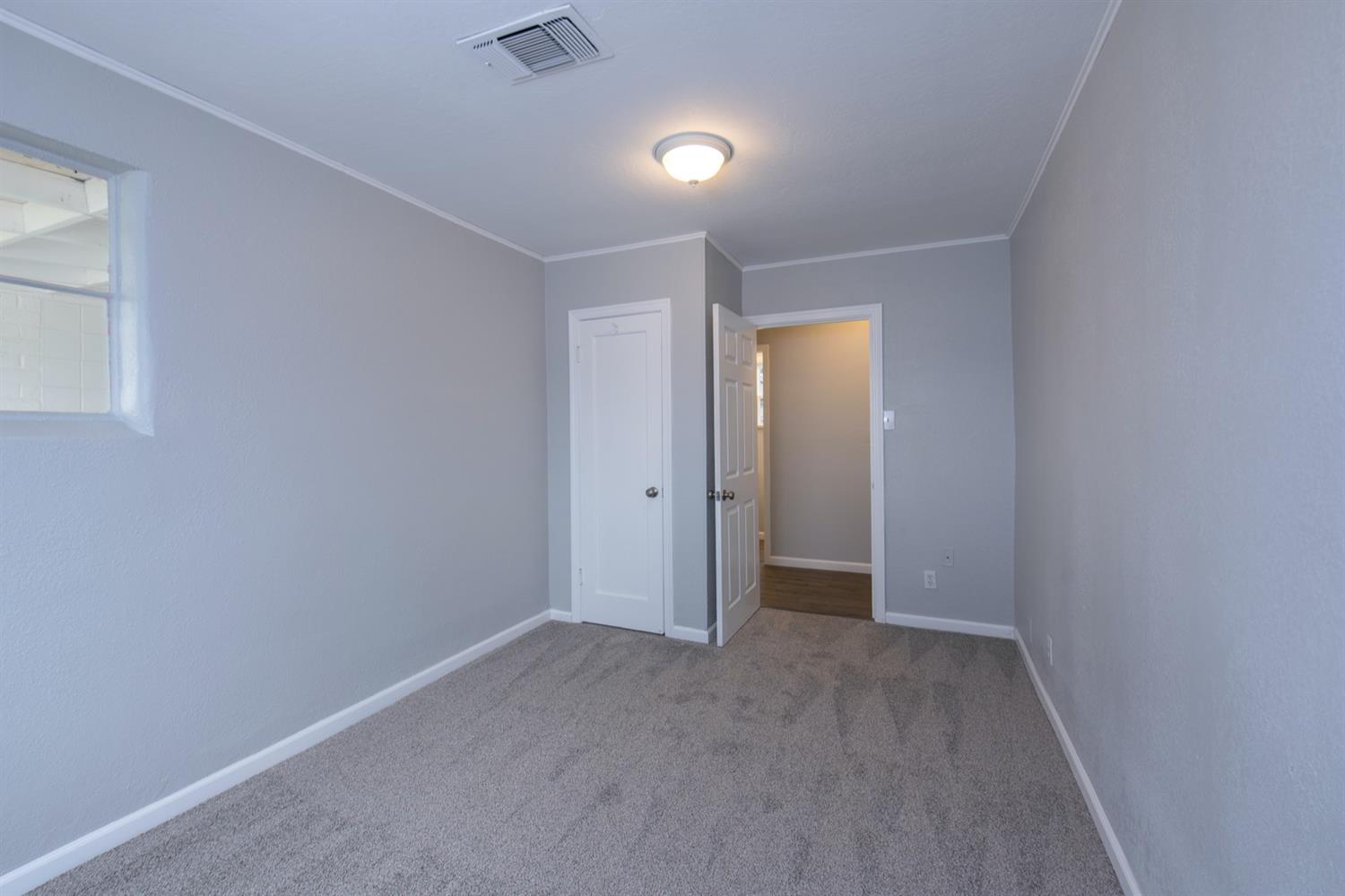 1322 North Reed Avenue Reedley, CA 93654 - Photo 33 of 54 a view of an empty room