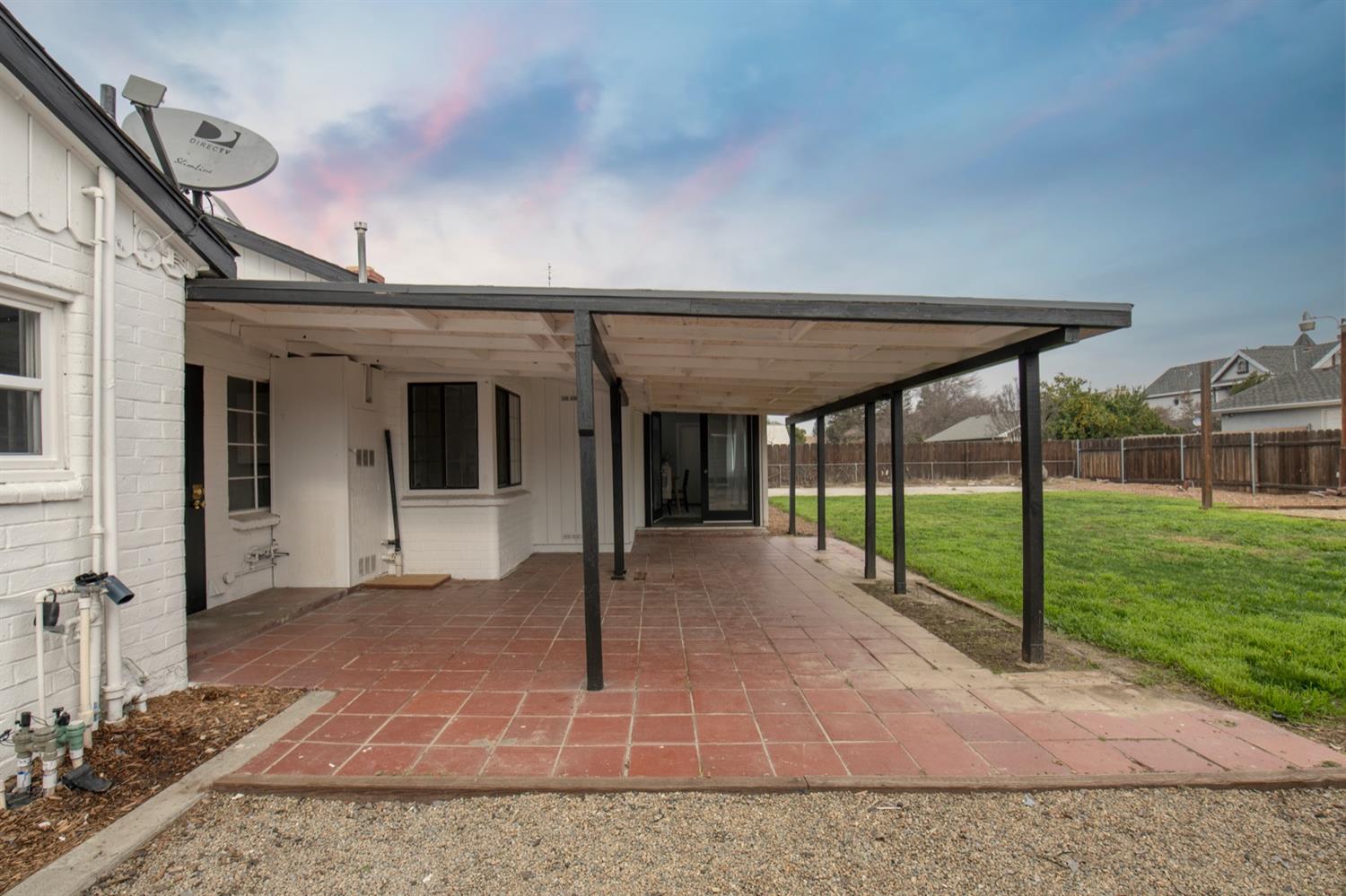 1322 North Reed Avenue Reedley, CA 93654 - Photo 36 of 54 a front view of a house with a porch