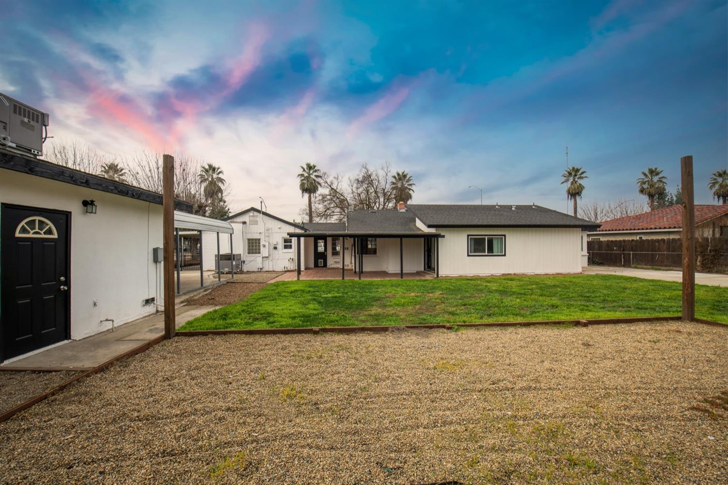 1322 North Reed Avenue Reedley, CA 93654 - Photo 40 of 54 a view of a house with a yard