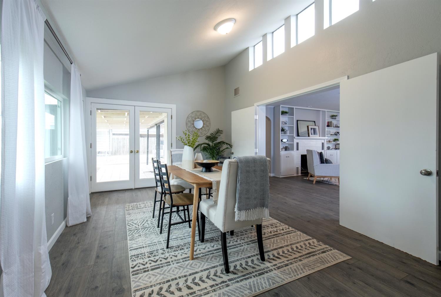 1322 North Reed Avenue Reedley, CA 93654 - Photo 9 of 54 a view of a livingroom with furniture and wooden floor