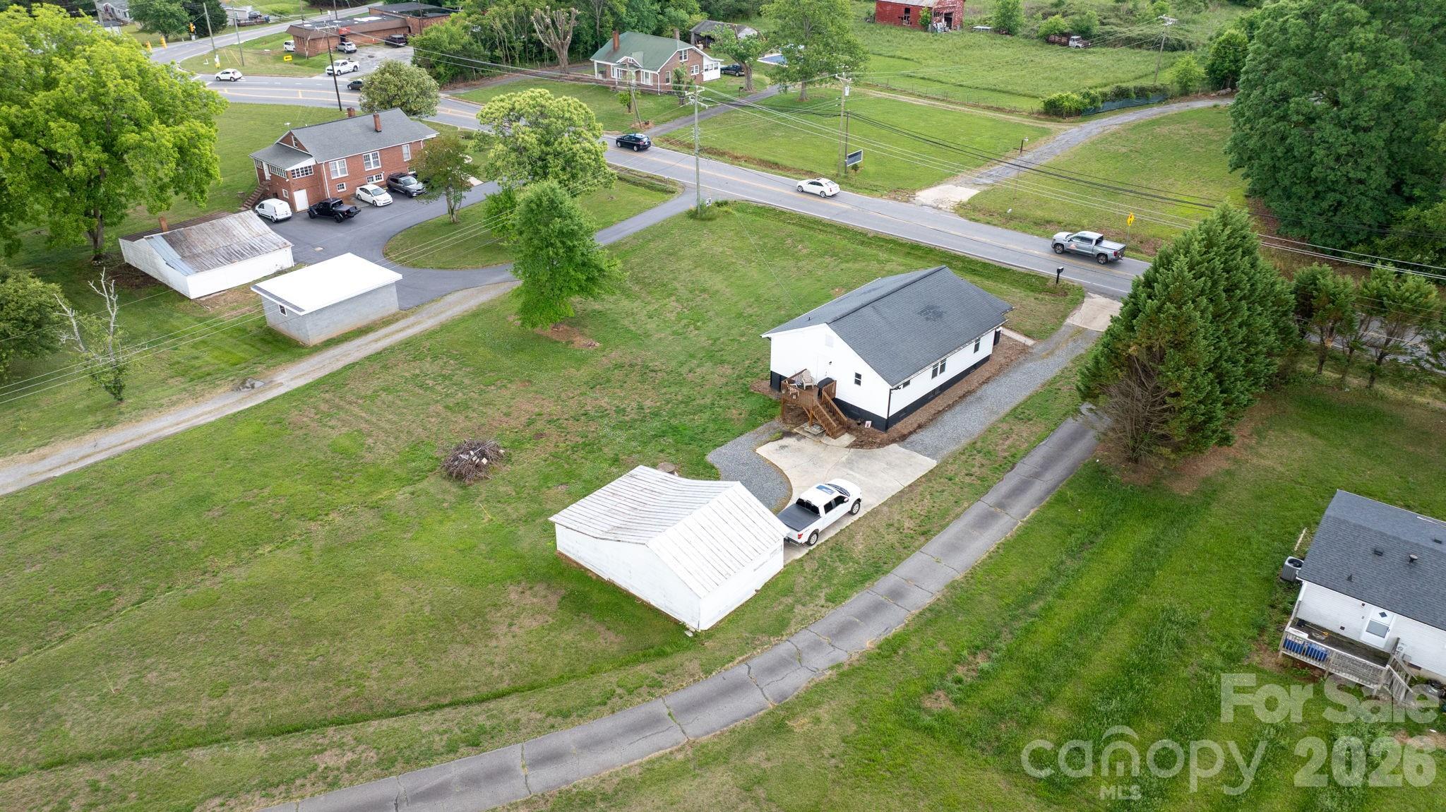 3941 Springs Road Northeast Conover, NC 28613 - Photo 20 of 21 a view of a house with a yard