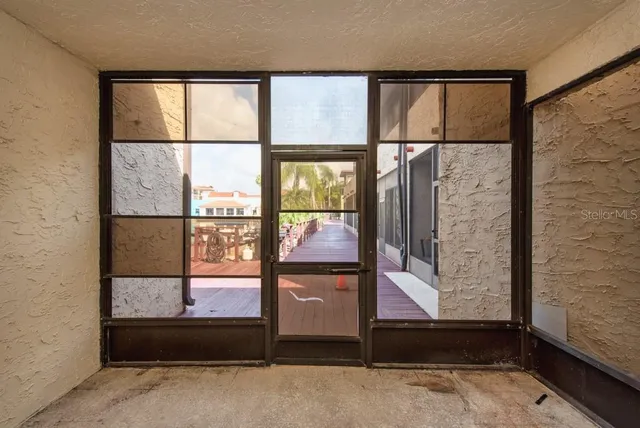 a view of gallery with door