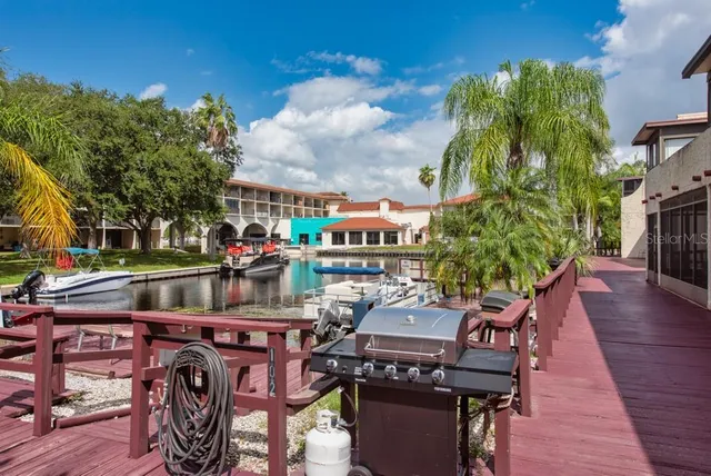 a view of swimming pool with outdoor seating