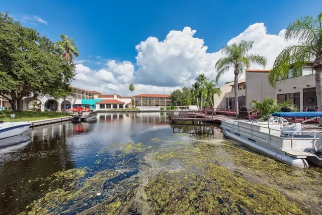 a view of a swimming pool with sitting area