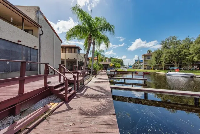 a view of a chairs and tables in the patio