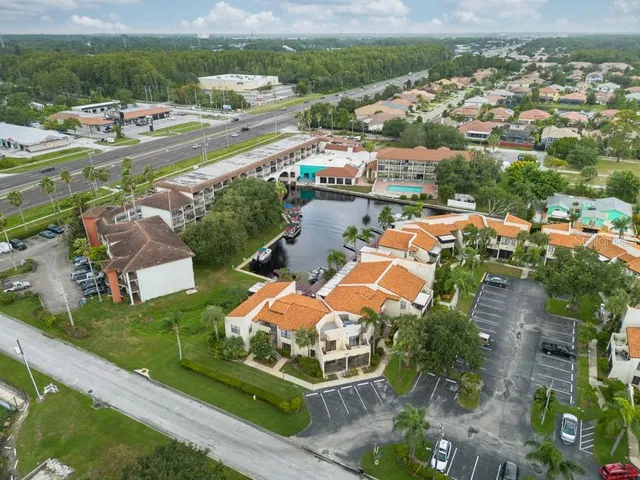 an aerial view of a house with a garden