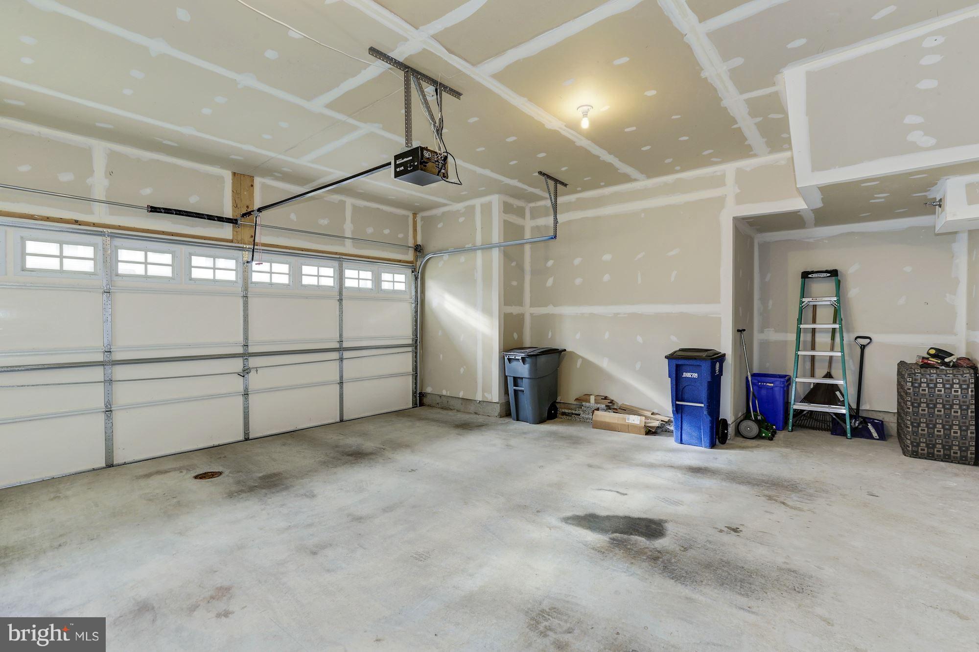 14405 Vedanta Way Silver Spring, MD 20906 - Photo 29 of 30 Large garage with storage room