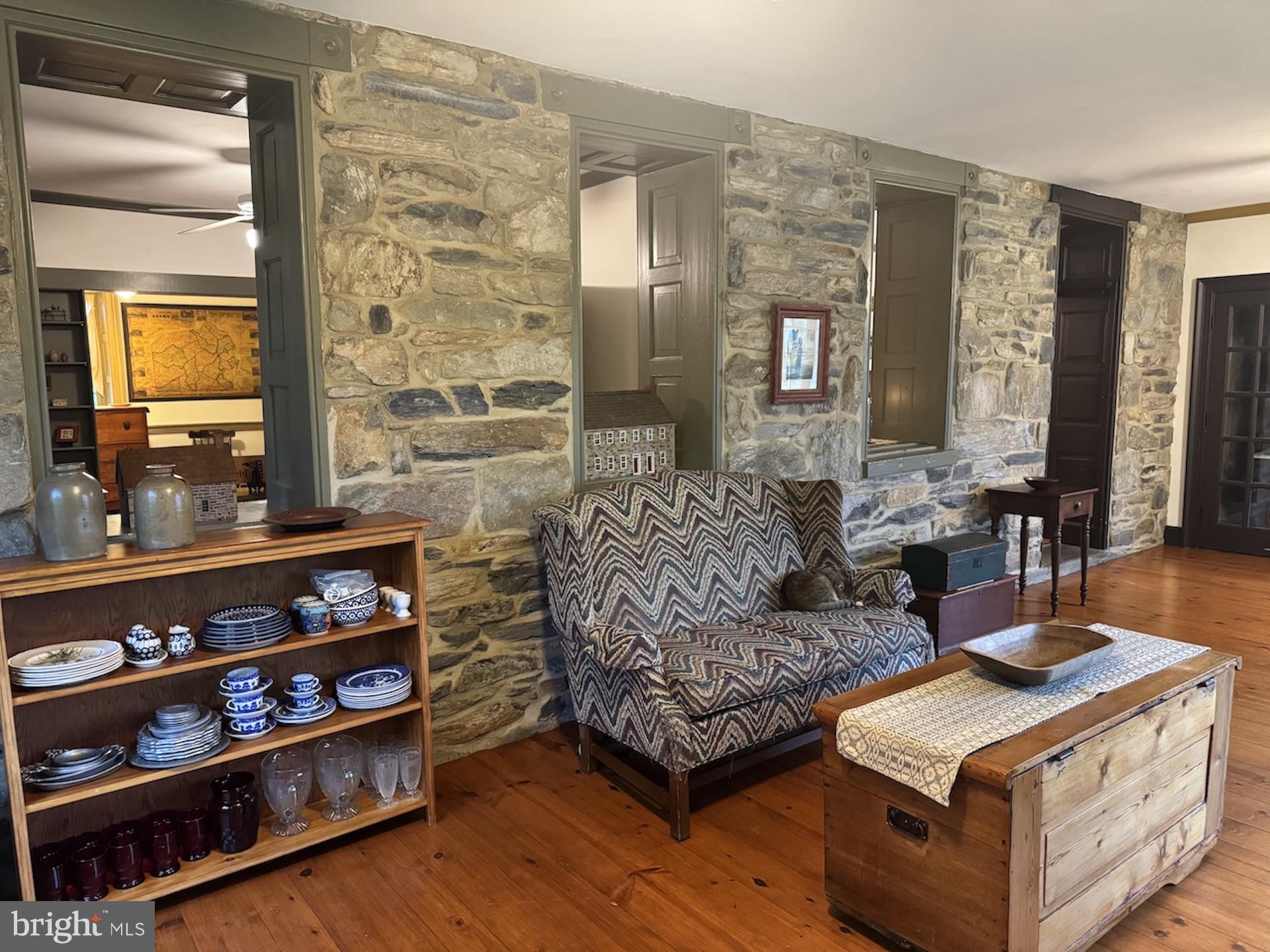 262 Orrtanna Road Orrtanna, PA 17353 - Photo 25 of 43 a living room with furniture and a fireplace