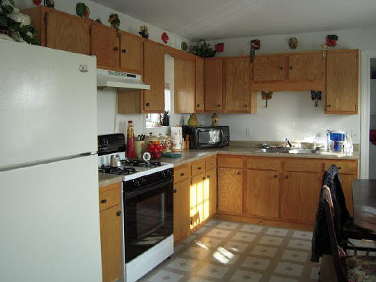 2849 Irene Road Belvidere, IL 61008 - Photo 9 of 11 a kitchen with stainless steel appliances granite countertop a sink stove and refrigerator