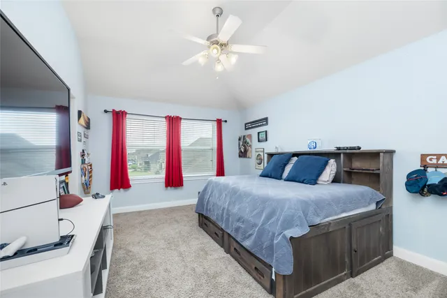 a bathroom with a sink a light fixture and a mirror