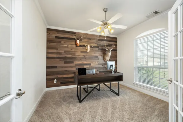 a view of a workspace with furniture