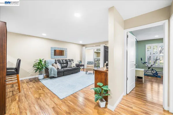 a living room with furniture and a table