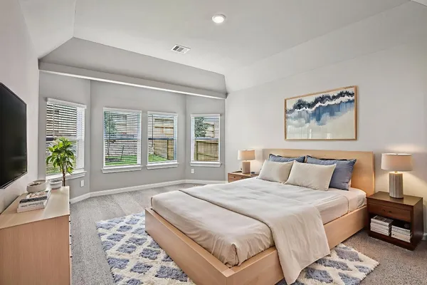 a spacious bathroom with a tub shower and sink