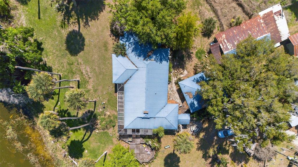 7970 Bannon Fish Camp Road Haines City, FL 33844 - Photo 18 of 73 an aerial view of residential houses with outdoor space