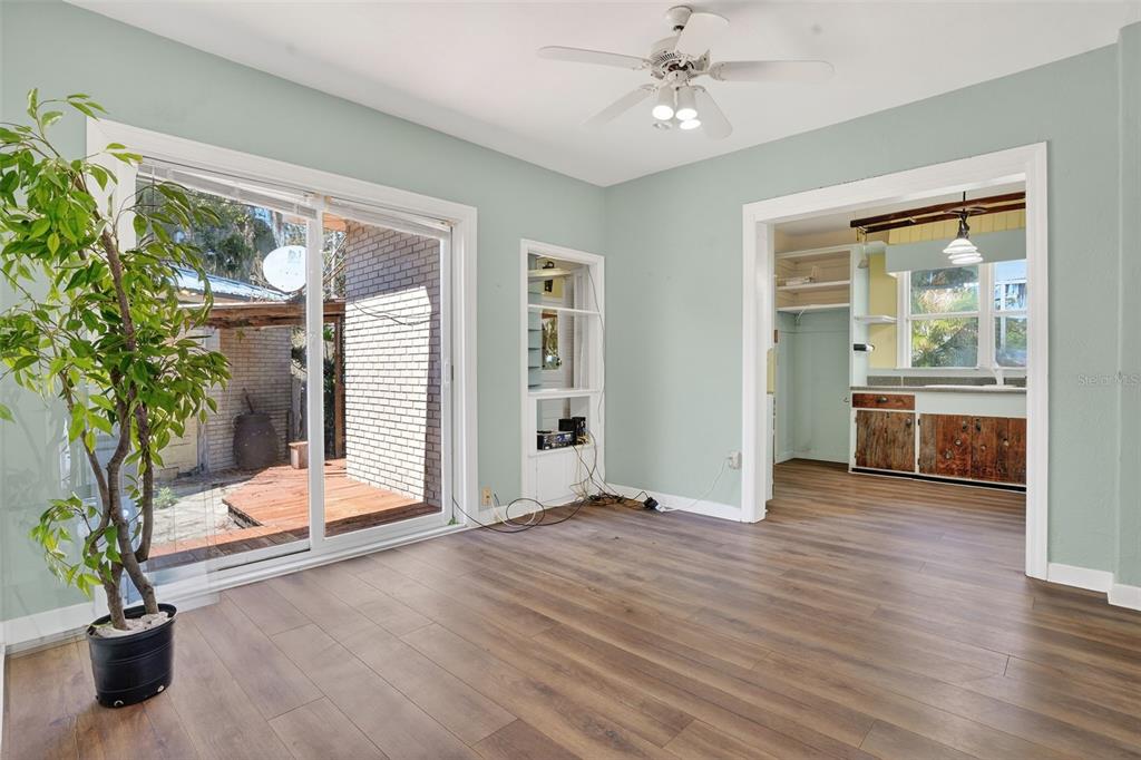 7970 Bannon Fish Camp Road Haines City, FL 33844 - Photo 60 of 73 a view of an empty room with a window and wooden floor