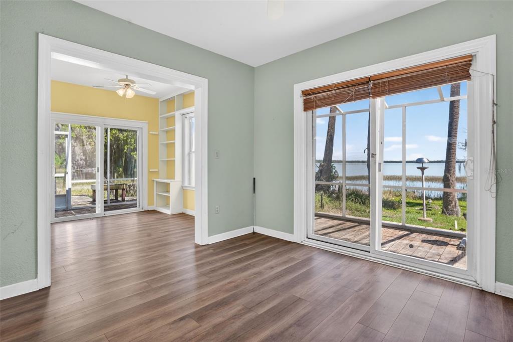 7970 Bannon Fish Camp Road Haines City, FL 33844 - Photo 63 of 73 wooden floor in an empty room with a window
