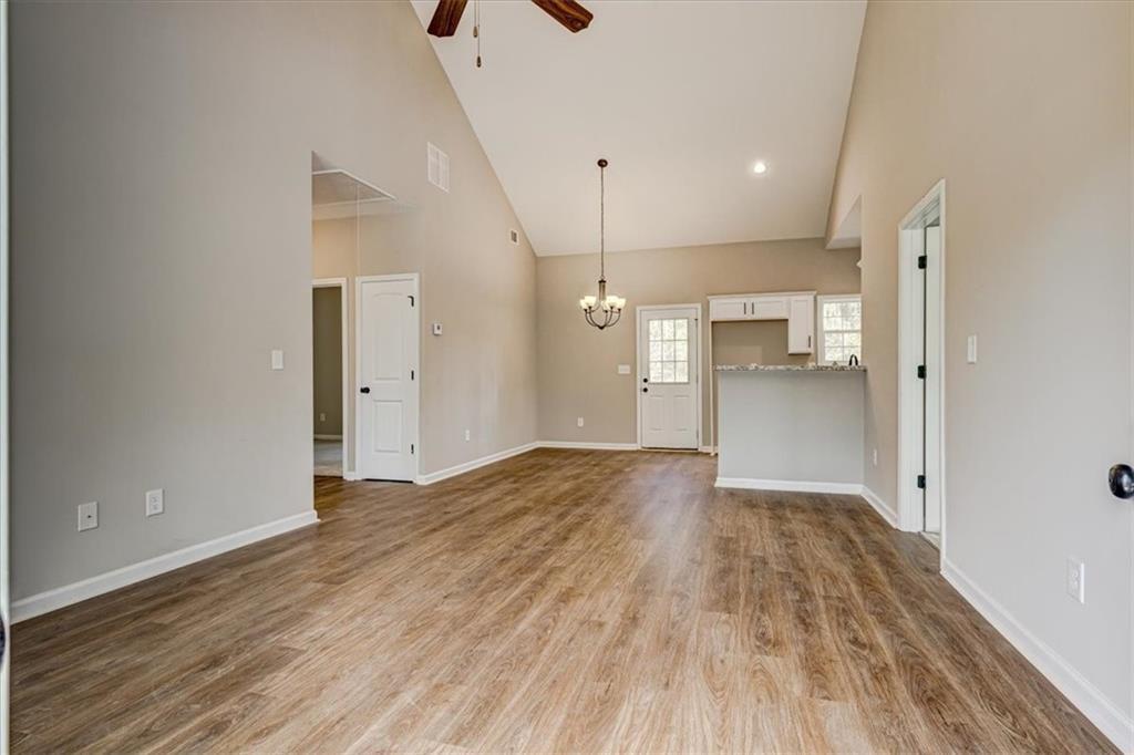 201 Loftis Road Temple, GA 30179 - Photo 2 of 14 a view of empty room with wooden floor