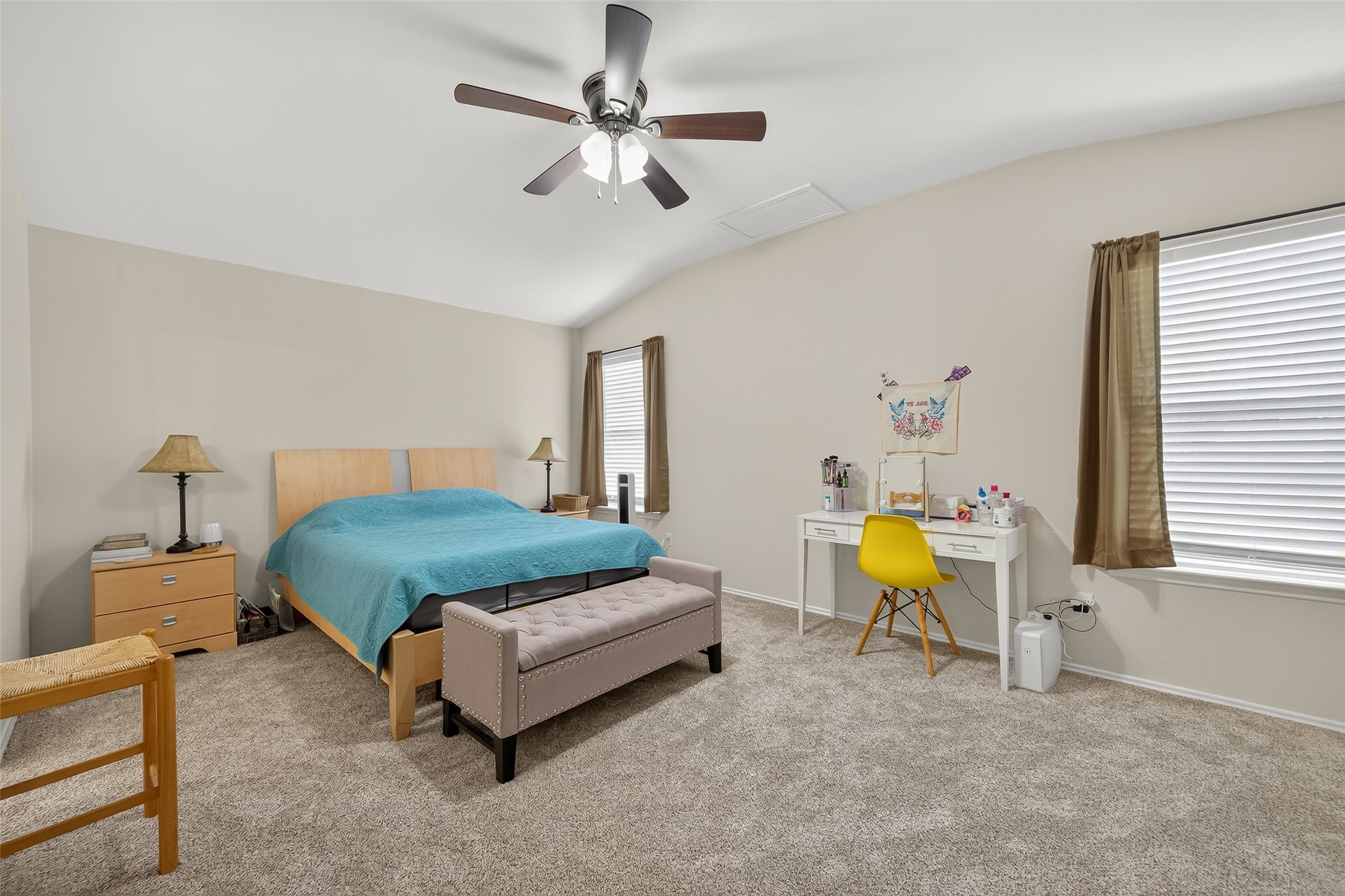 8311 Tartan Court Rosharon, TX 77583 - Photo 31 of 48 a bedroom with a bed and a chandelier