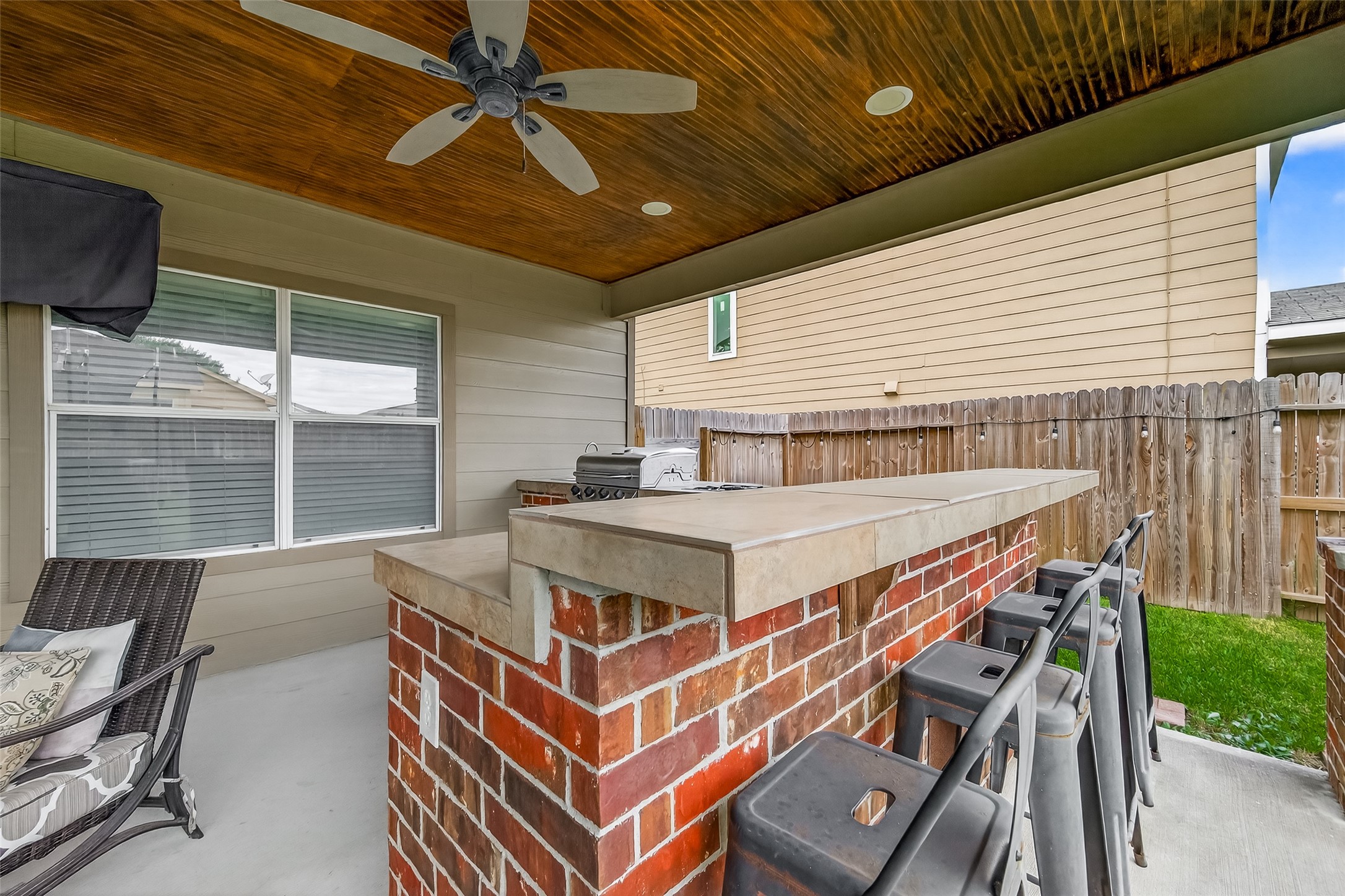 8311 Tartan Court Rosharon, TX 77583 - Photo 43 of 48 a roof deck with a chair and potted plants