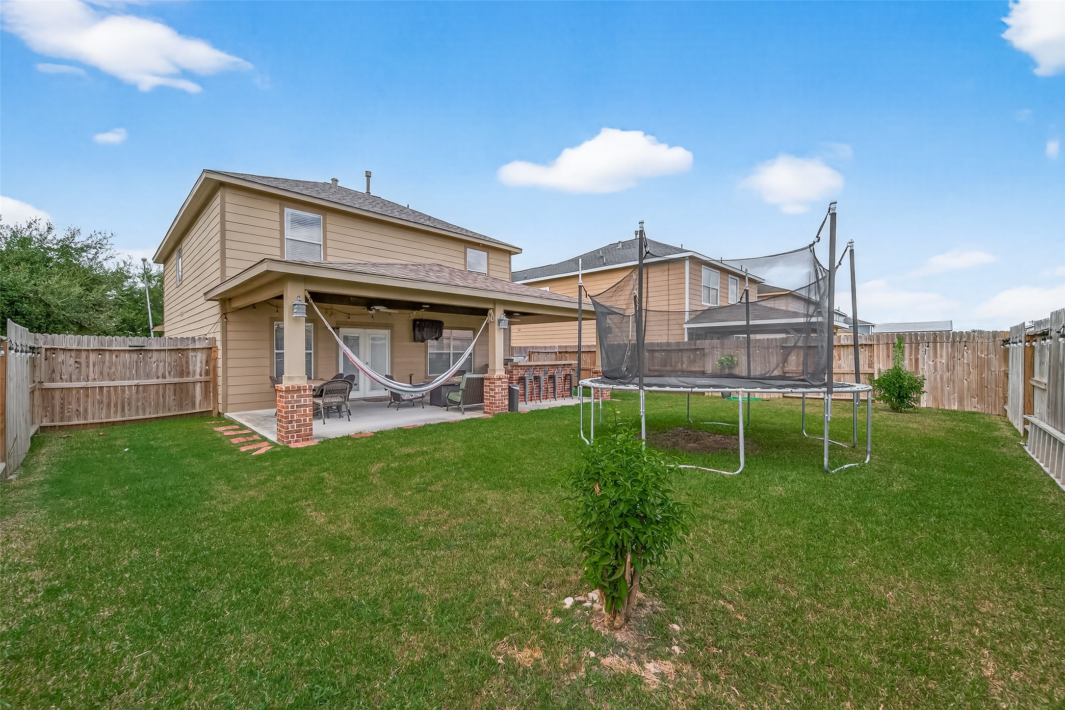 8311 Tartan Court Rosharon, TX 77583 - Photo 46 of 48 a view of a house with a backyard