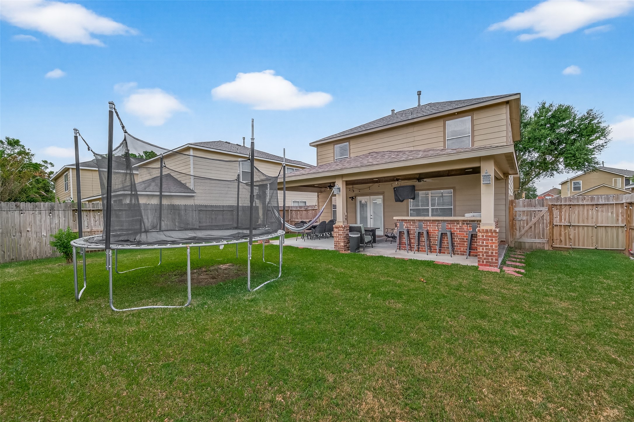 8311 Tartan Court Rosharon, TX 77583 - Photo 47 of 48 a view of house with backyard and patio