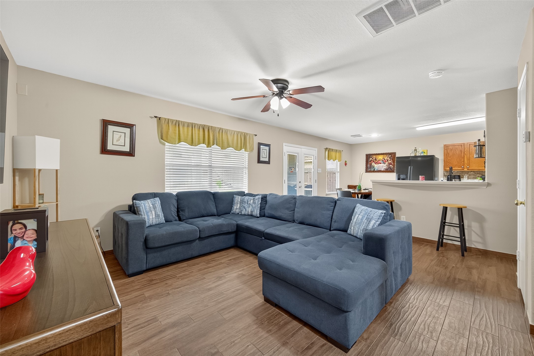 8311 Tartan Court Rosharon, TX 77583 - Photo 9 of 48 a living room with furniture and a wooden floor