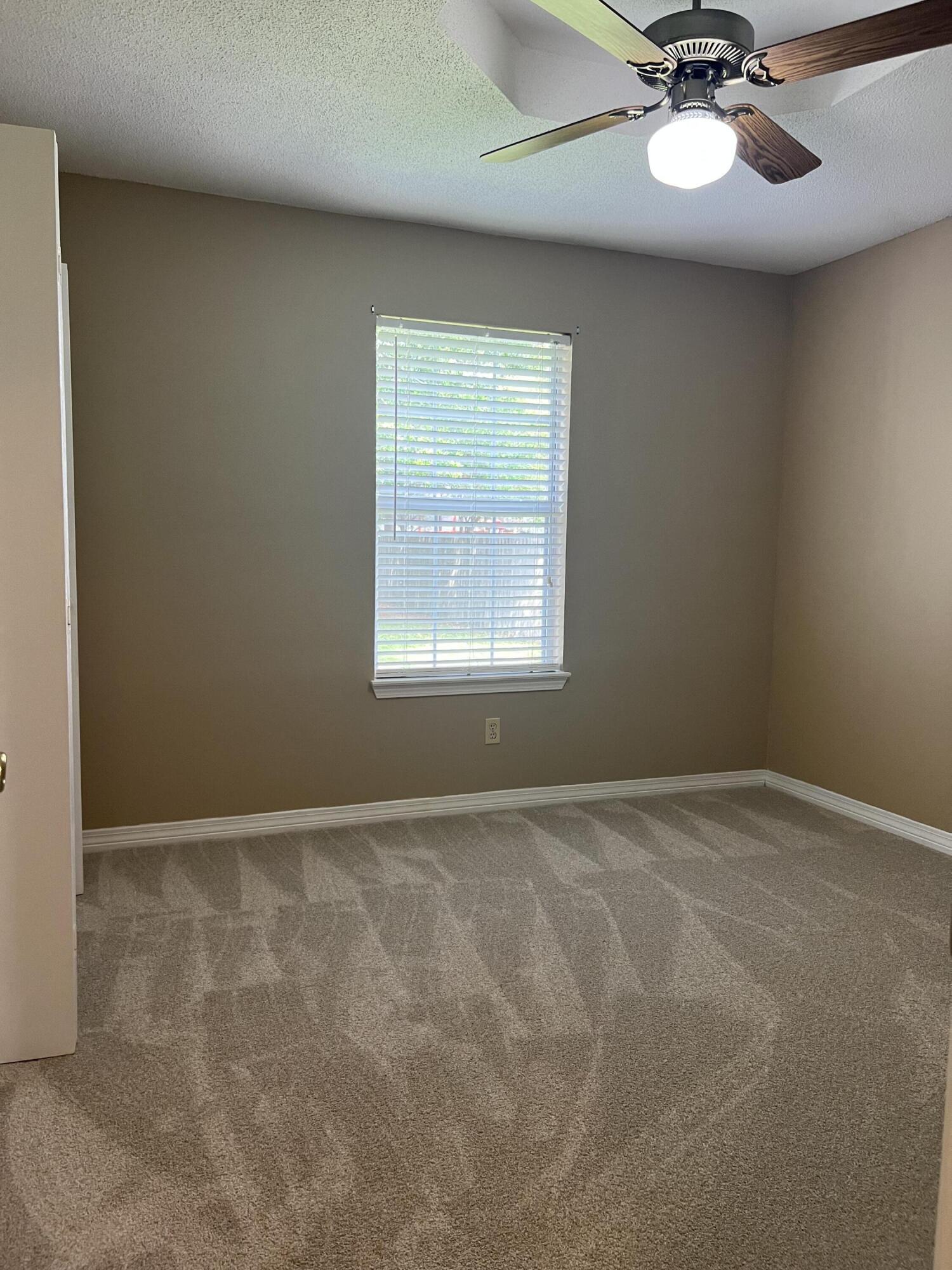 159 Nun Drive Crestview, FL 32536 - Photo 21 of 27 a view of an empty room with a window