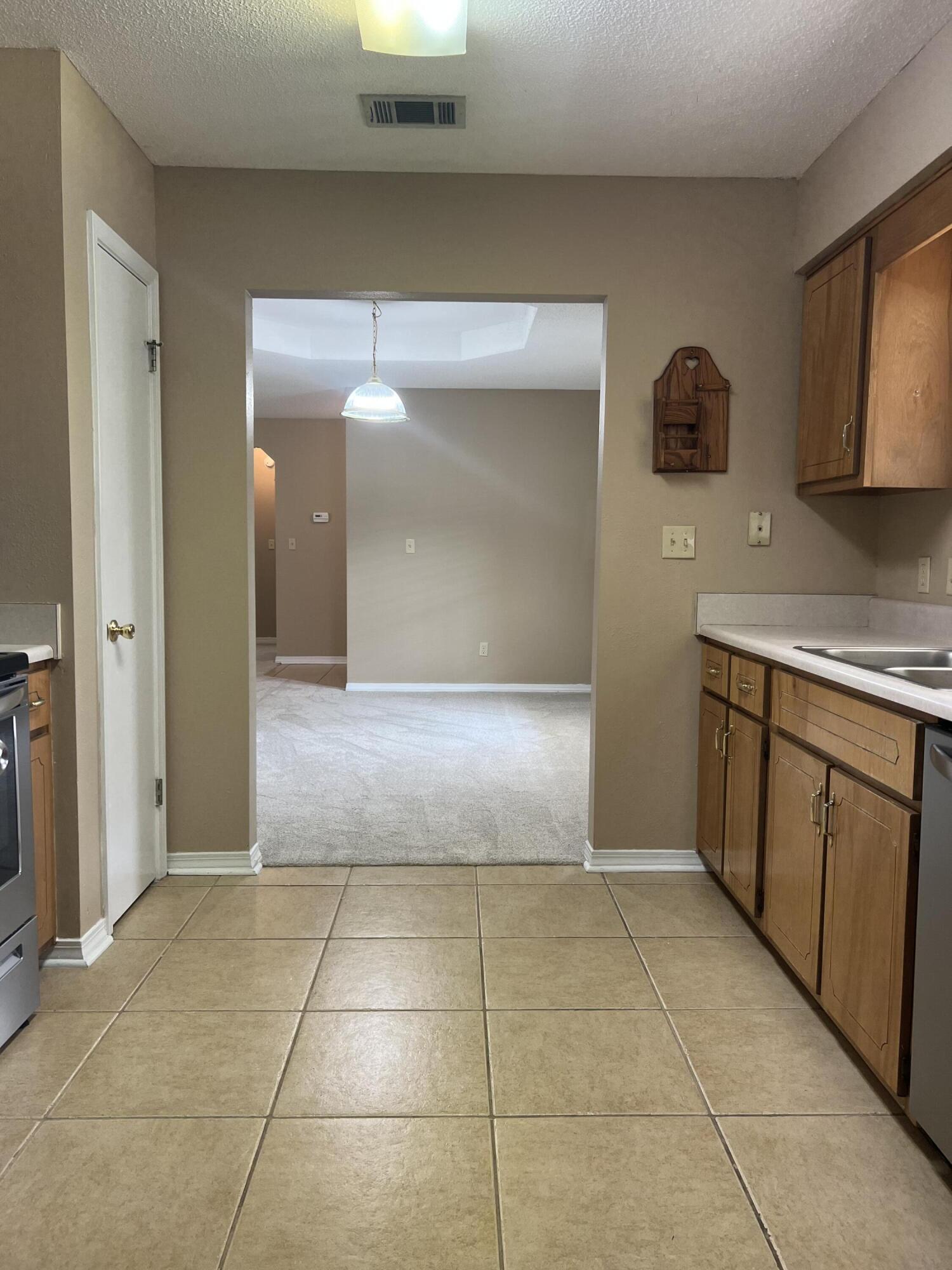 159 Nun Drive Crestview, FL 32536 - Photo 5 of 27 a view of a kitchen with a sink