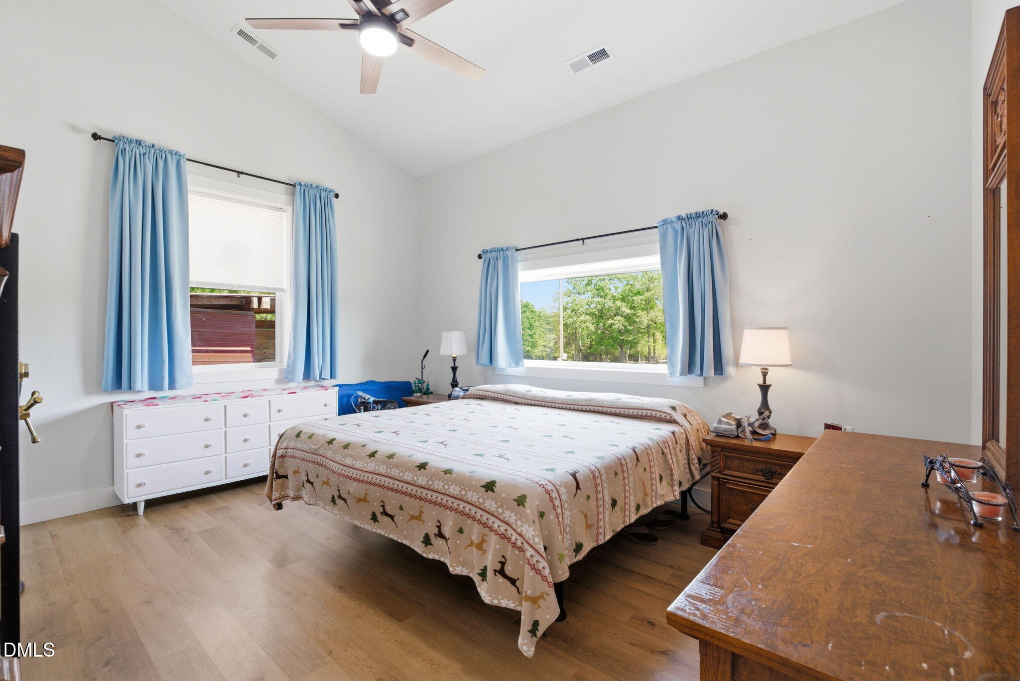 5416 Pulley Town Road Zebulon, NC 27597 - Photo 61 of 74 a bedroom with a bed and a table