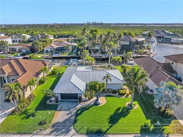 a view of a city with lawn chairs