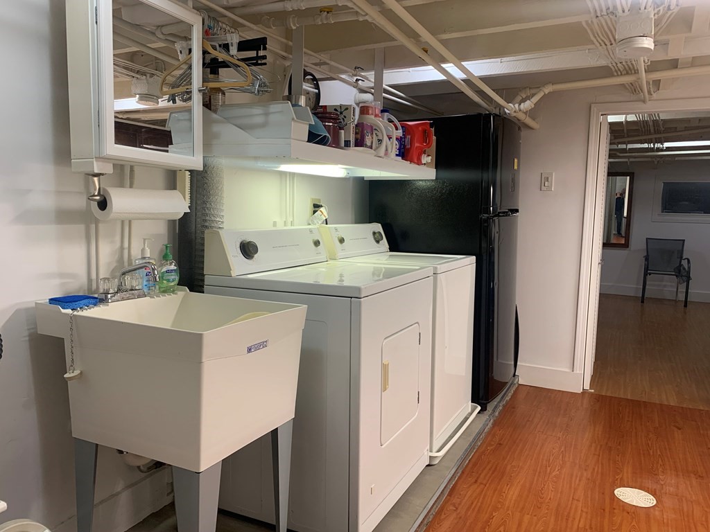 35 5th Street Medford, MA 02155 - Photo 16 of 42 a utility room with dryer and washer