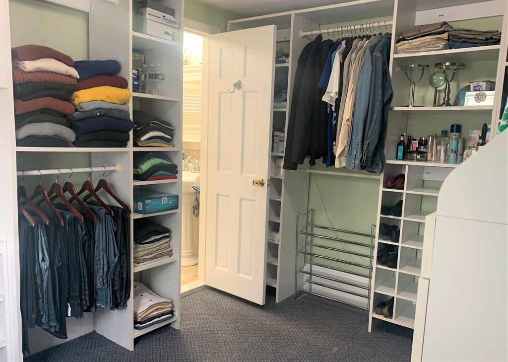 35 5th Street Medford, MA 02155 - Photo 25 of 42 a view of walk in closet with clothes and shoes