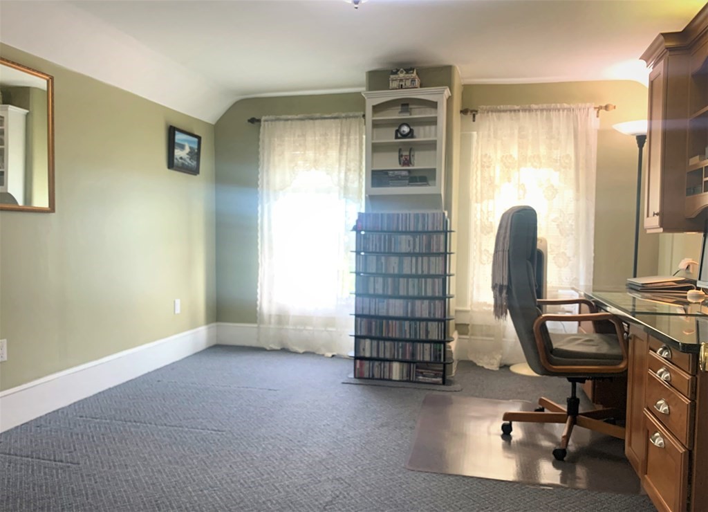 35 5th Street Medford, MA 02155 - Photo 29 of 42 a view of workspace with a window and couch