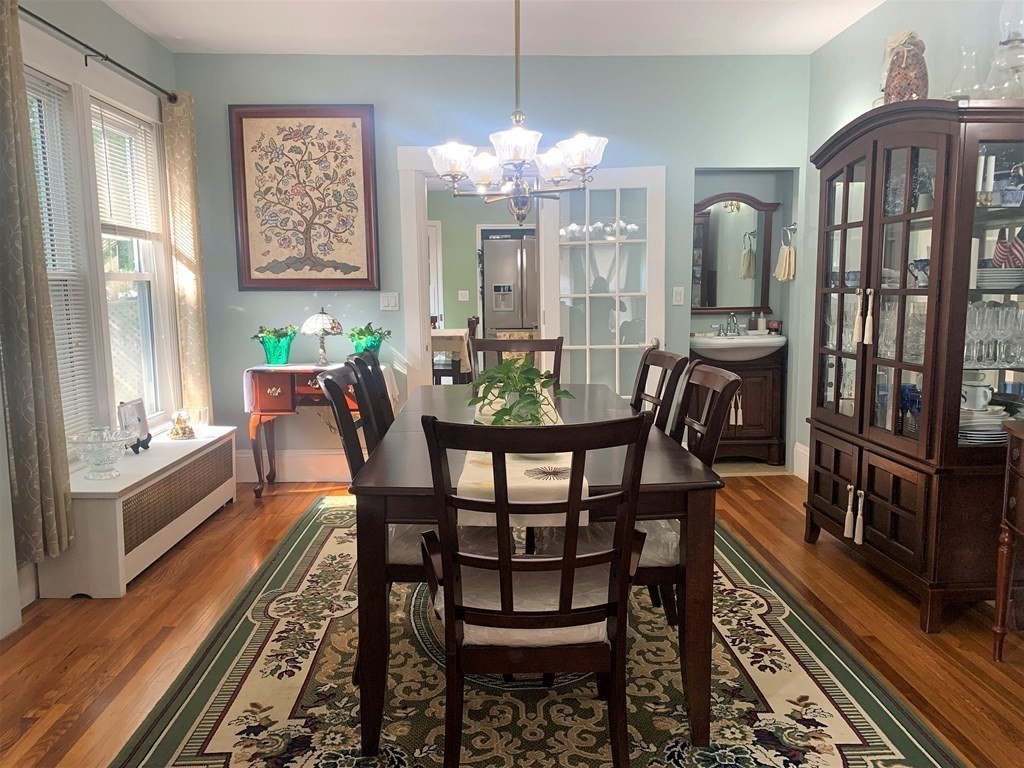 35 5th Street Medford, MA 02155 - Photo 10 of 42 a view of a dining room with furniture window and wooden floor