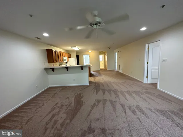 a kitchen with a stove and a sink