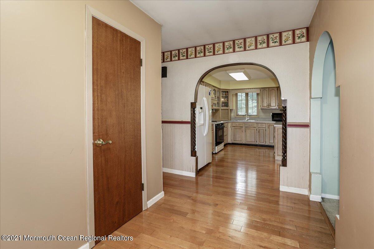 41 Haines Street Lanoka Harbor, NJ 08734 - Photo 11 of 43 a view of living room and bedroom with wooden floor