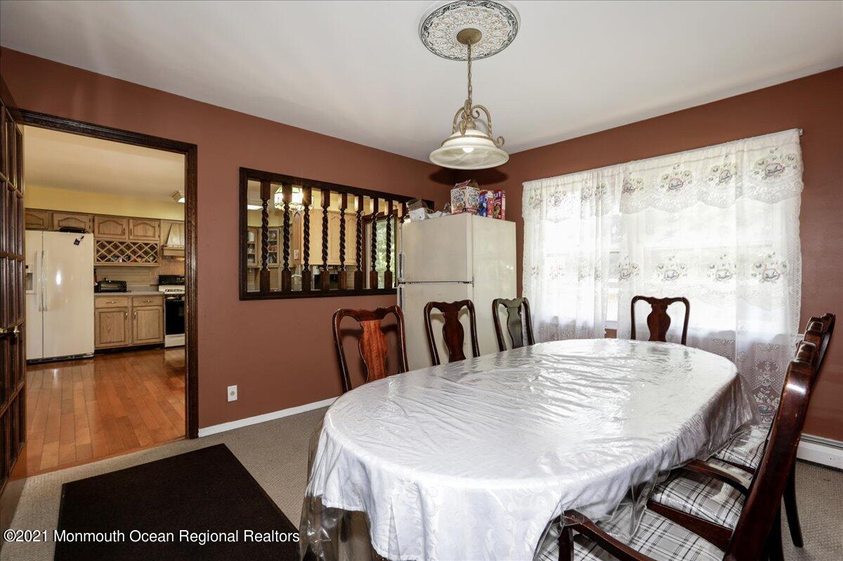 41 Haines Street Lanoka Harbor, NJ 08734 - Photo 19 of 43 a view of a dining room with furniture window and wooden floor