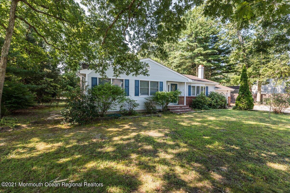 41 Haines Street Lanoka Harbor, NJ 08734 - Photo 3 of 43 a front view of a house with a yard
