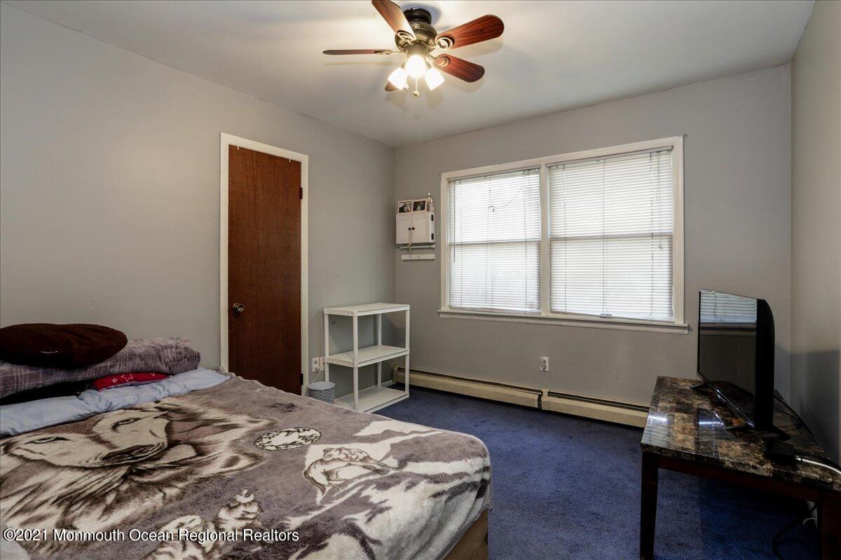 41 Haines Street Lanoka Harbor, NJ 08734 - Photo 24 of 43 a bedroom with a bed and a window