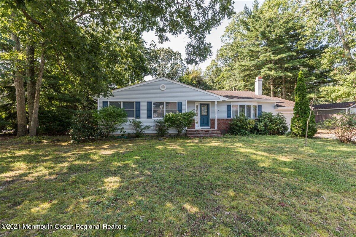 41 Haines Street Lanoka Harbor, NJ 08734 - Photo 4 of 43 a front view of a house with a yard