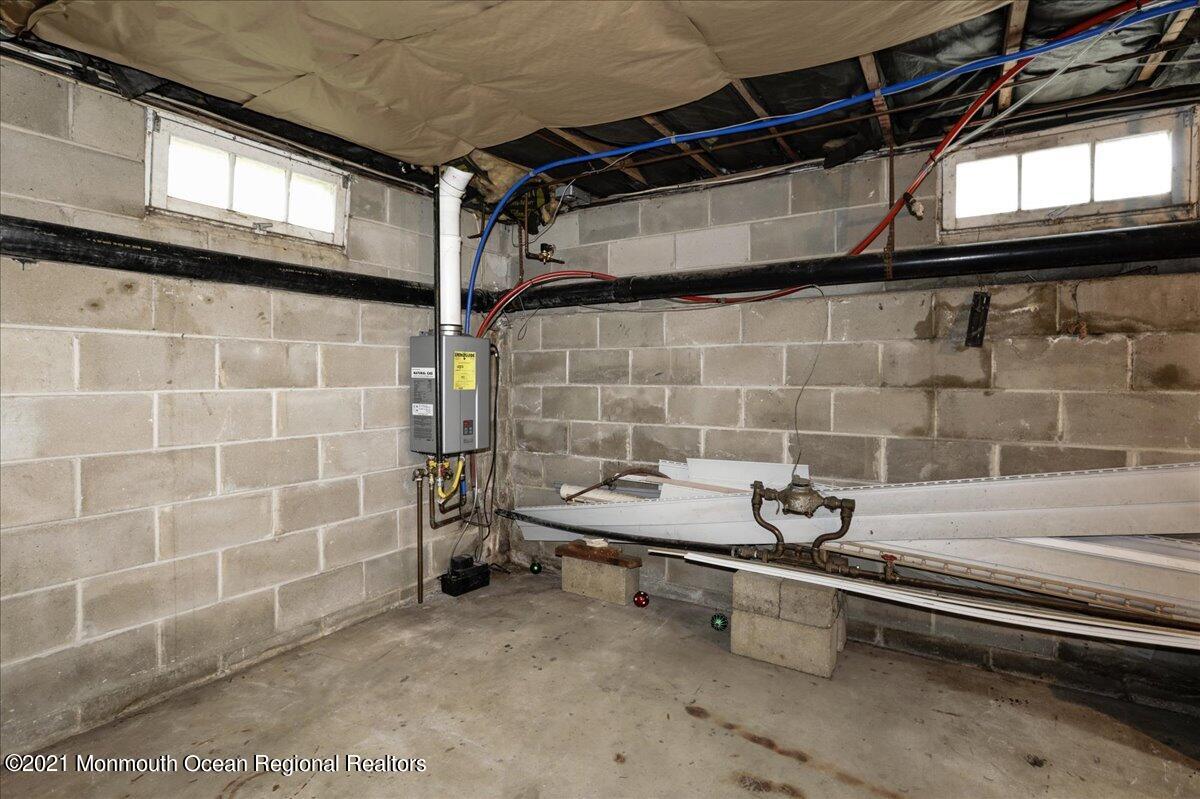 41 Haines Street Lanoka Harbor, NJ 08734 - Photo 31 of 43 a bathroom with a sink and a shower